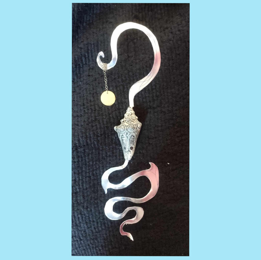 Coquillage prit dans un soupir musical, un silence